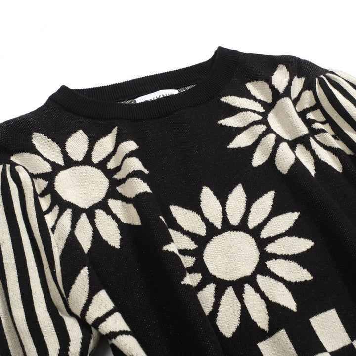 Kvinnors stickade plagg med puffärm i svart solrosjacquard