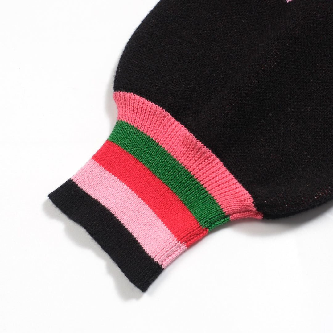 Kvinnors svarta stickade plagg i jacquard bubbelärm