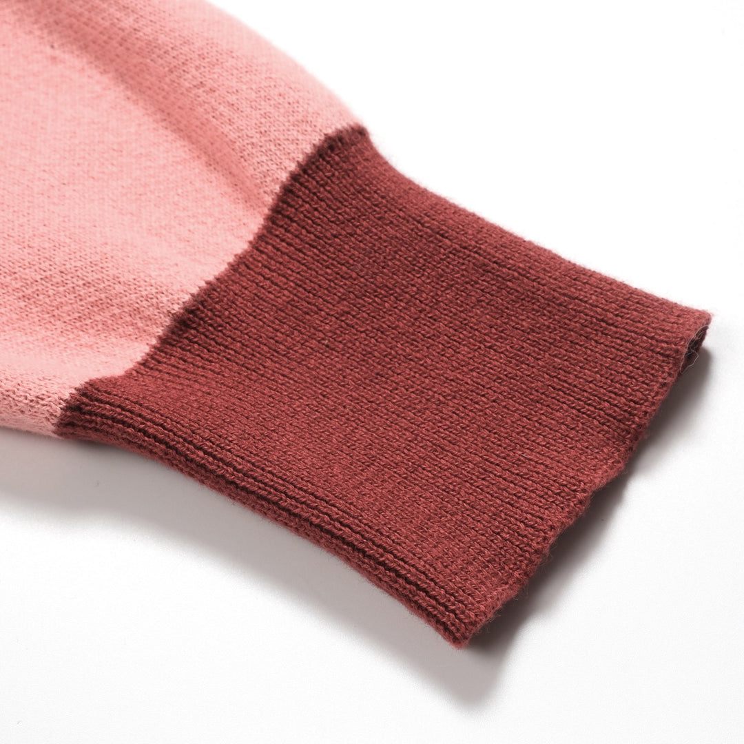 Kvinnors rosa svala jacquard stickat med V-ringad