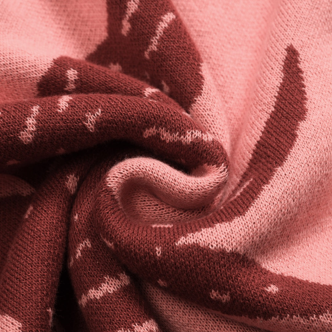 Kvinnors rosa svala jacquard stickat med V-ringad