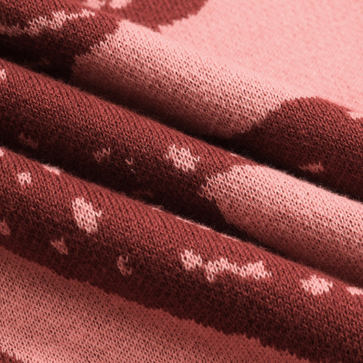 Kvinnors rosa svala jacquard stickat med V-ringad