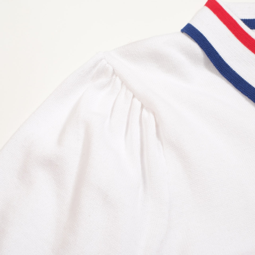 Polo de punto con manga abullonada y diseño de rayas color albaricoque blanco para mujer