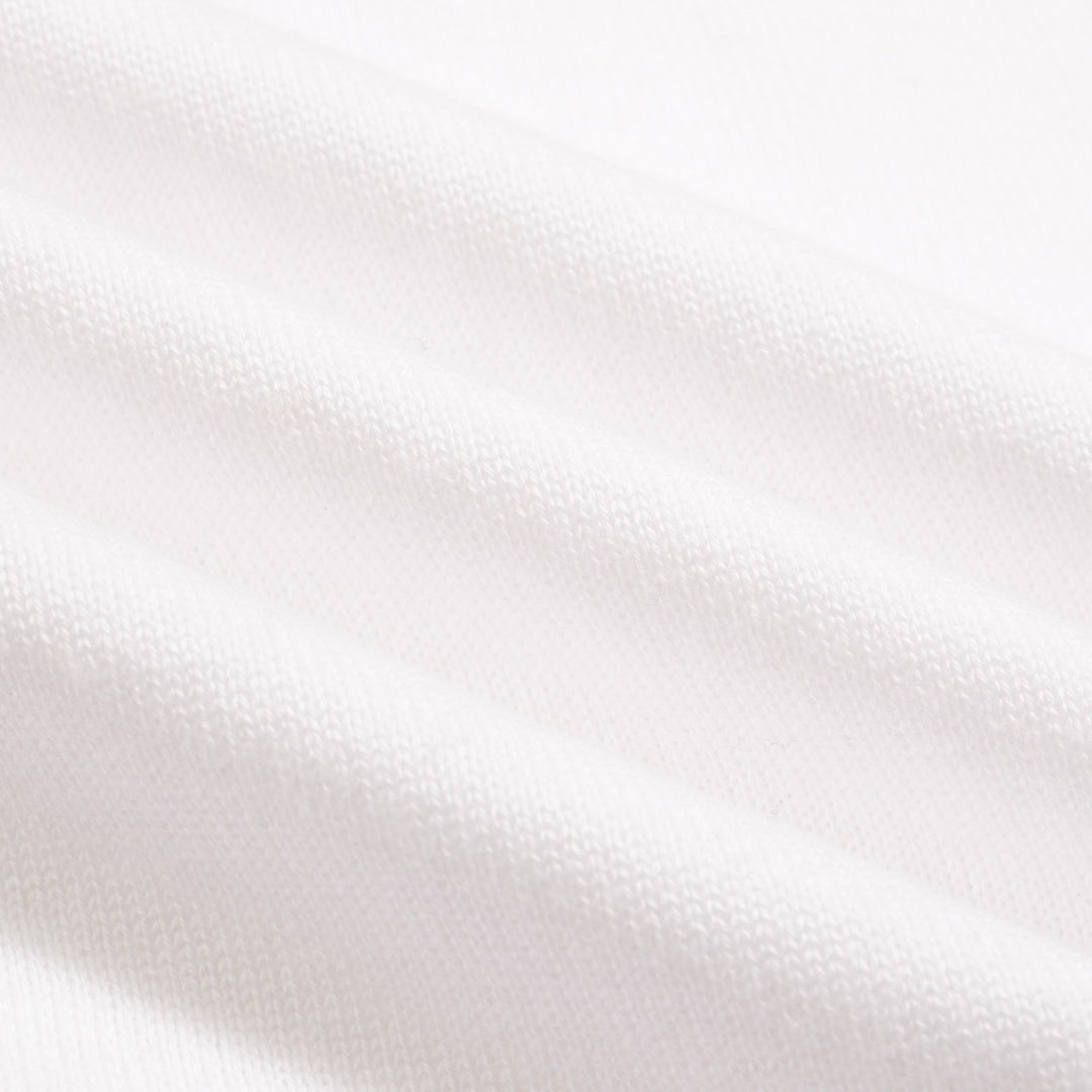 Polo de punto con manga abullonada y diseño de rayas color albaricoque blanco para mujer