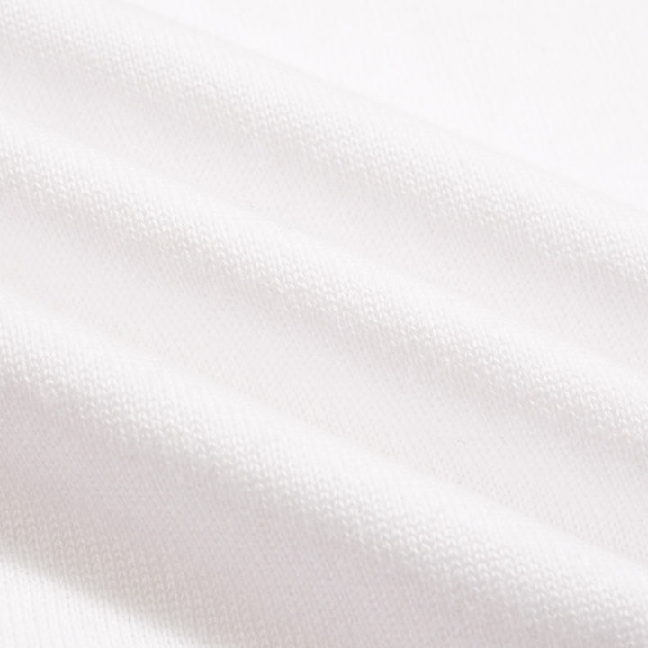 Polo de punto con manga abullonada y diseño de rayas color albaricoque blanco para mujer