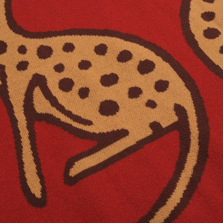 Polo de hombre de punto jacquard animal con estampado de leopardo rojo