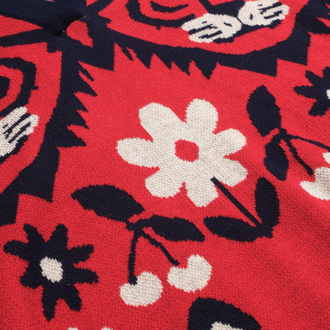 Dampikétröja med V-ringad röd jacquardstickad konst