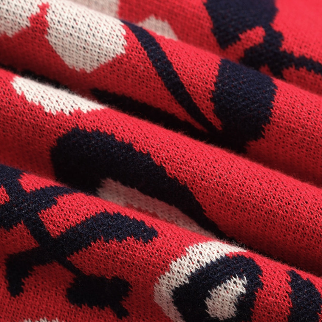 Dampikétröja med V-ringad röd jacquardstickad konst