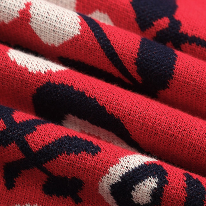 Dampikétröja med V-ringad röd jacquardstickad konst