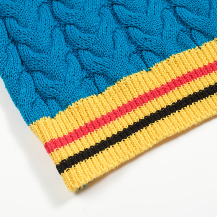 Jersey de punto azul con cuello de pico y estética retro para hombre