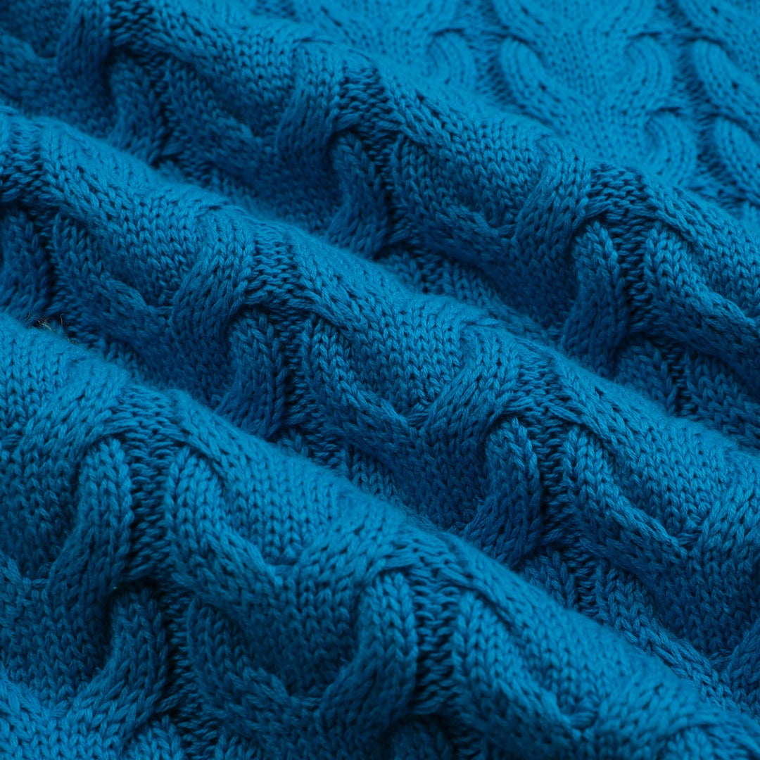 Jersey de punto azul con cuello de pico y estética retro para hombre