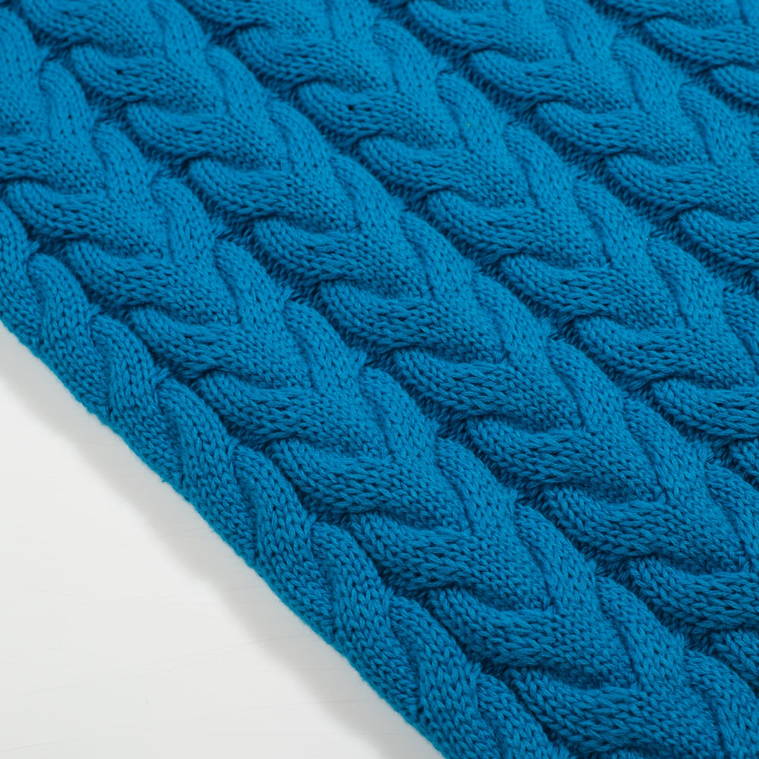 Jersey de punto azul con cuello de pico y estética retro para hombre