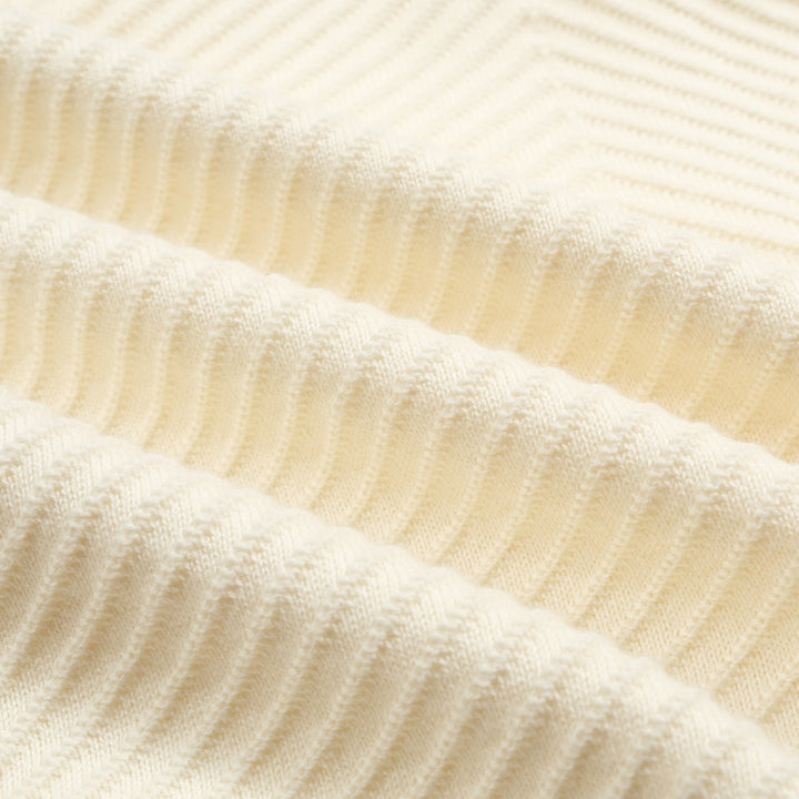 Polo de hombre de punto blanco textura albaricoque con cuello de pico