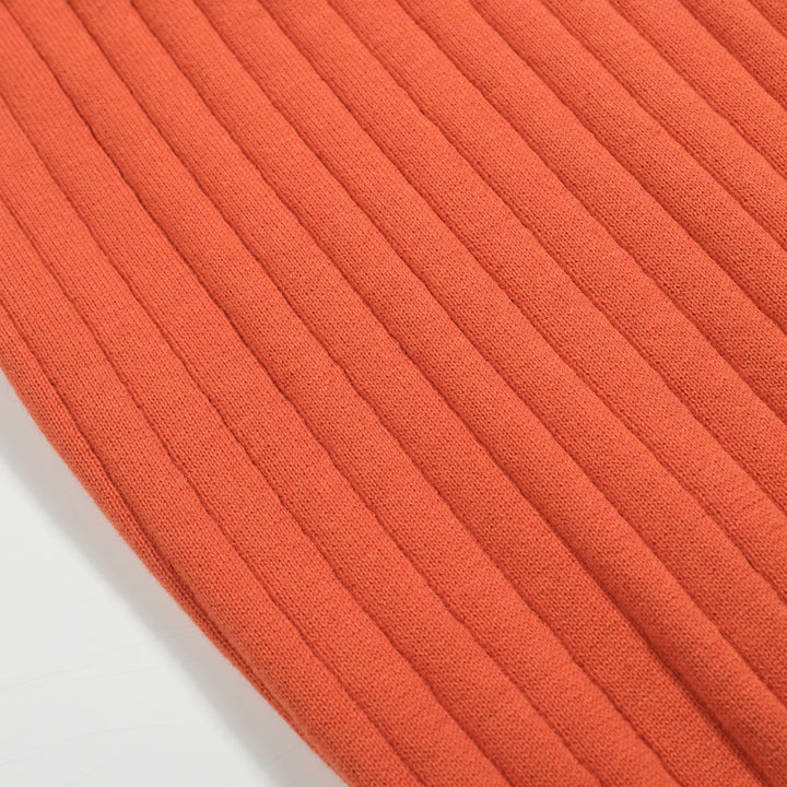 Polo de punto de rayas verticales naranja para hombre