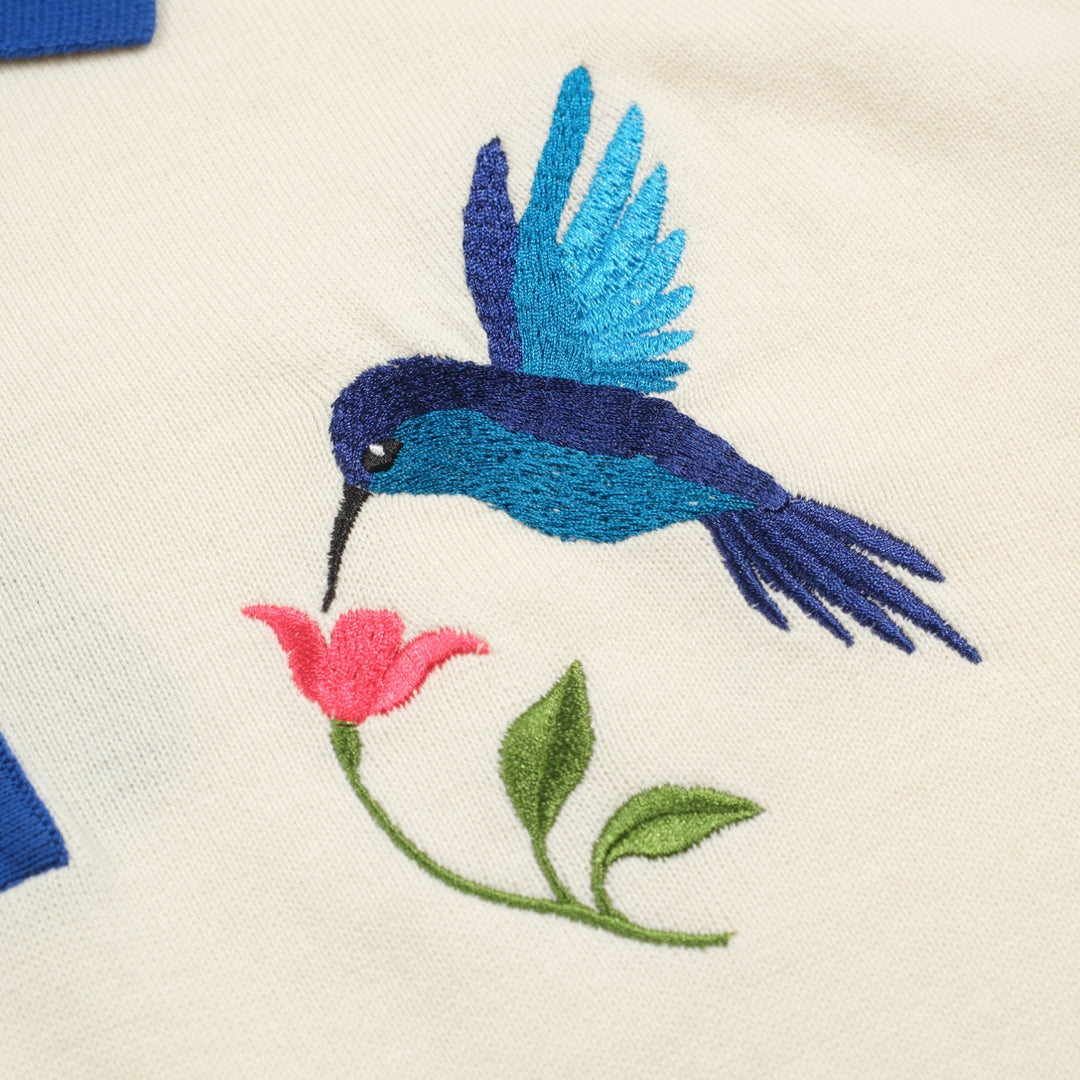 Polo de punto con bordado de colibrí blanco para hombre