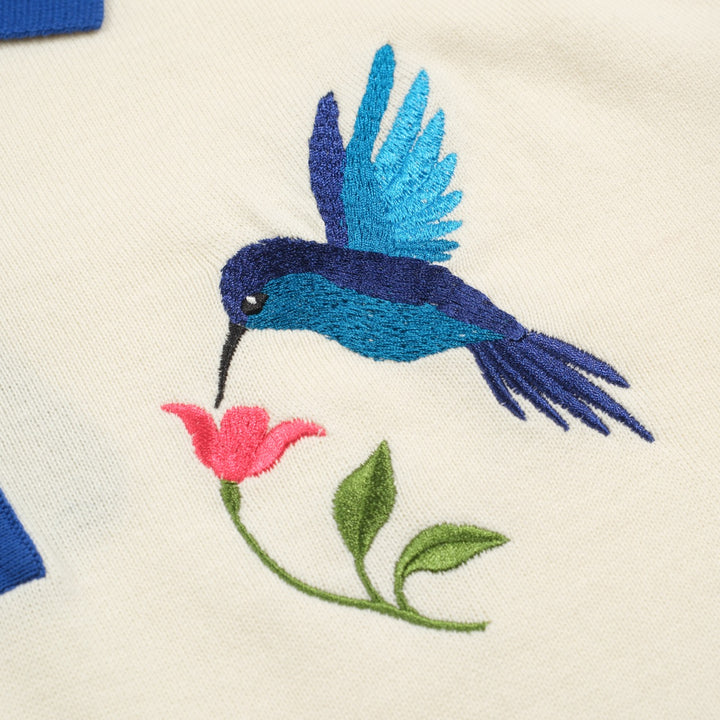Polo de punto con bordado de colibrí blanco para hombre