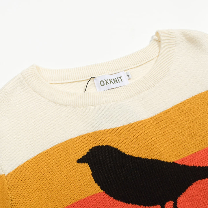 Maglieria donna jacquard con motivo uccellino rigato bianco albicocca