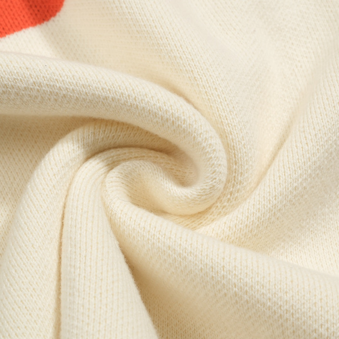 Maglieria donna jacquard con motivo uccellino rigato bianco albicocca