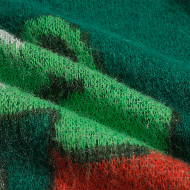 Punto de mujer de felpa de cocodrilo verde en jacquard