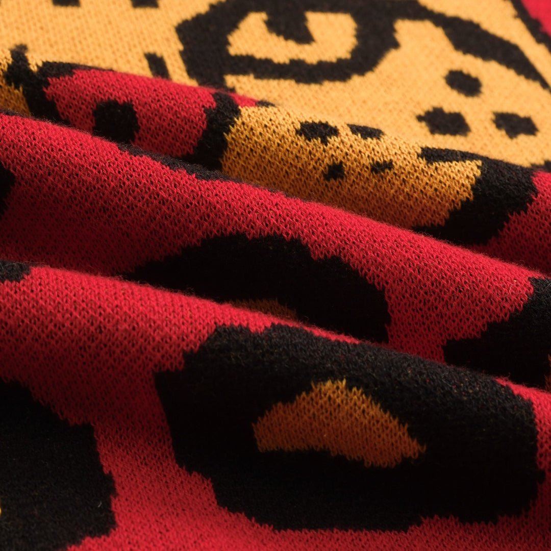 Rött leopardmönstrat retro stickat plagg för kvinnor