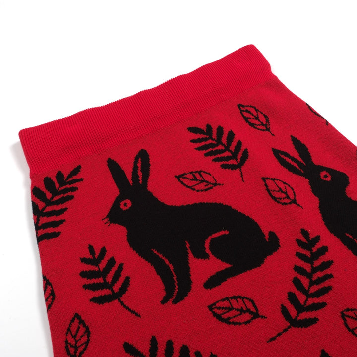 Damkjol i röda jacquardstickade djur