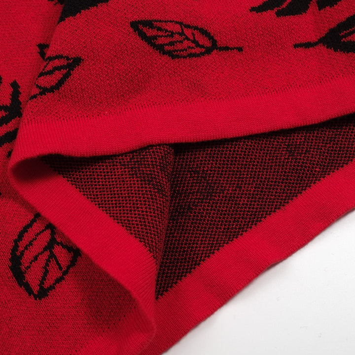 Damkjol i röda jacquardstickade djur