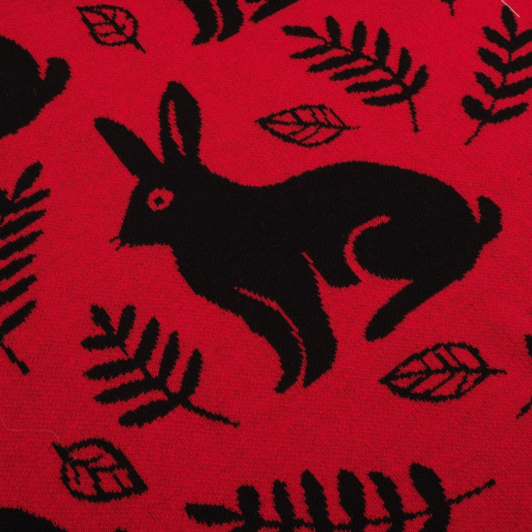 Damkjol i röda jacquardstickade djur