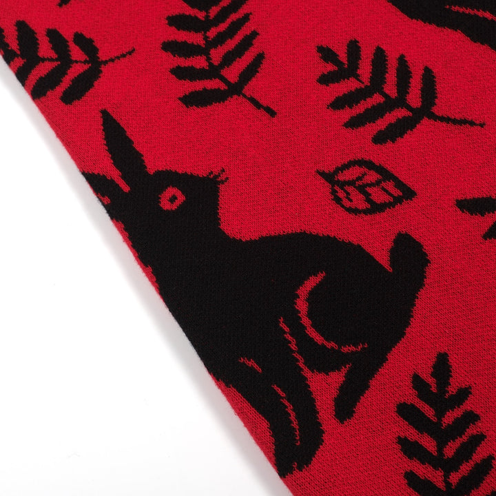 Damkjol i röda jacquardstickade djur