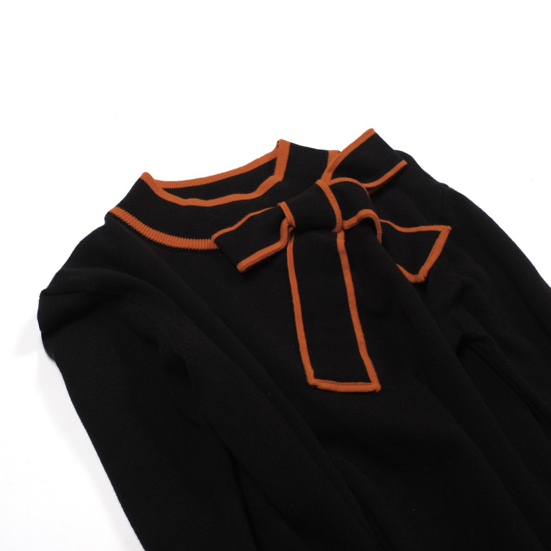 Polo da donna in maglia nera alla moda retrò street art