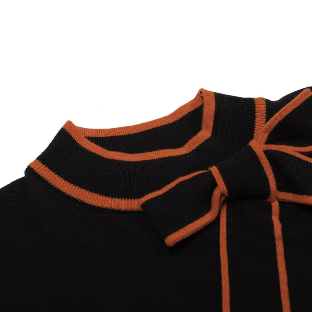 Polo da donna in maglia nera alla moda retrò street art