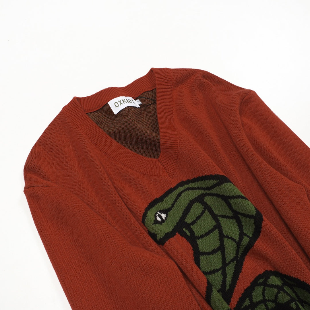 Maglieria uomo scollo a V jacquard serpente arancione