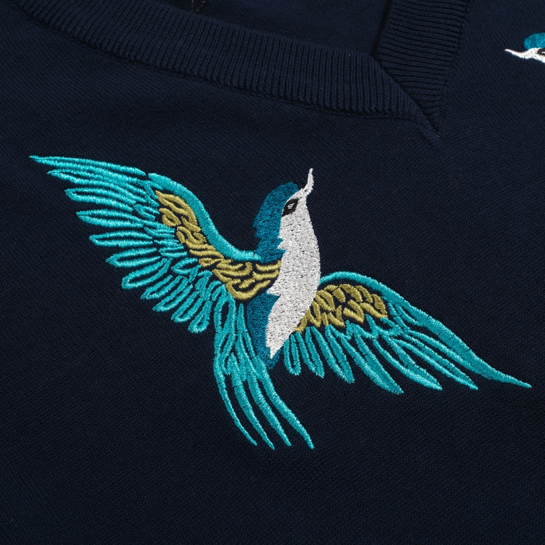 Kvinders mørkeblå broderede bobleærmer strik