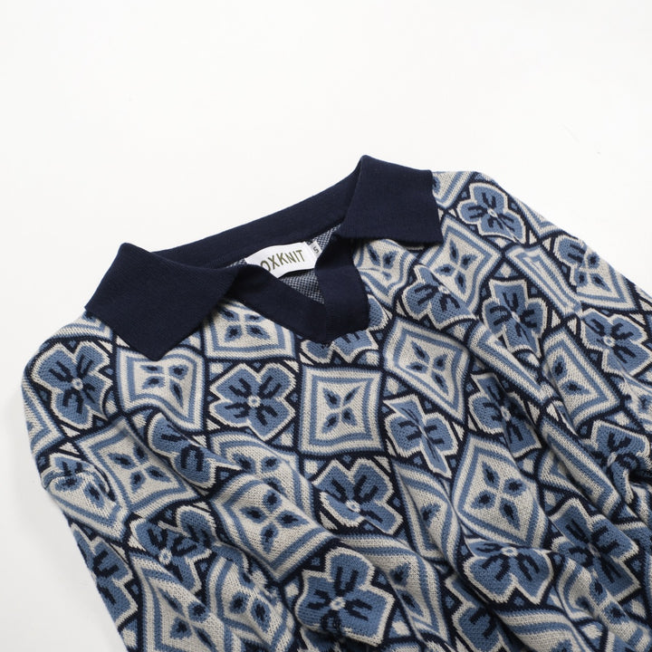 Donkerblauwe gebreide herenpolo met V-hals uit de jaren 60