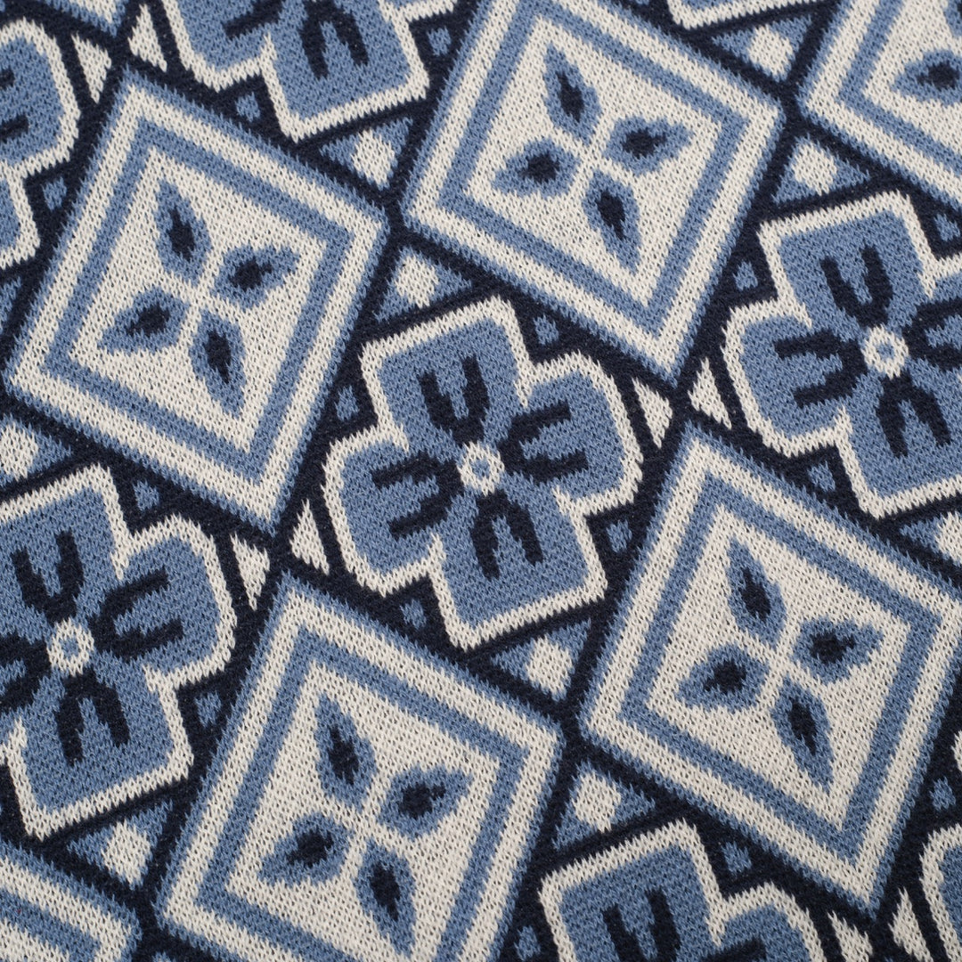 Donkerblauwe gebreide herenpolo met V-hals uit de jaren 60