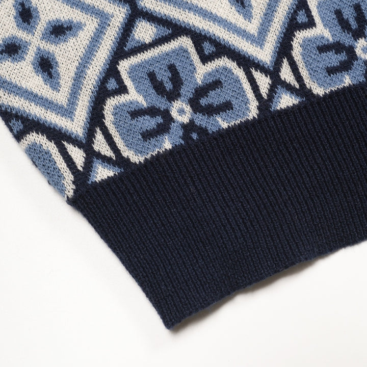 Donkerblauwe gebreide herenpolo met V-hals uit de jaren 60