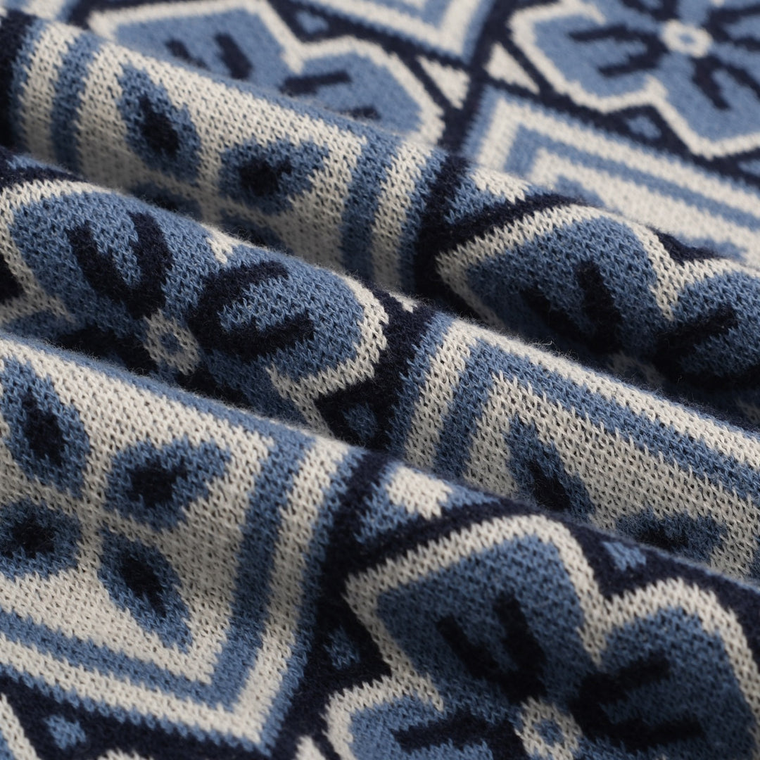 Donkerblauwe gebreide herenpolo met V-hals uit de jaren 60