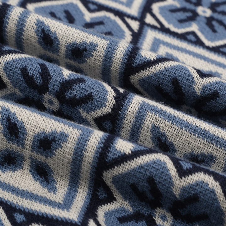 Donkerblauwe gebreide herenpolo met V-hals uit de jaren 60