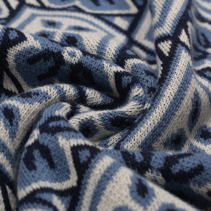 Donkerblauwe gebreide herenpolo met V-hals uit de jaren 60