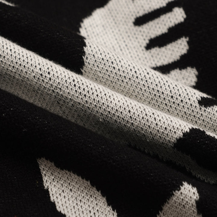 Herre sort dyre- og plante-jacquardstrik