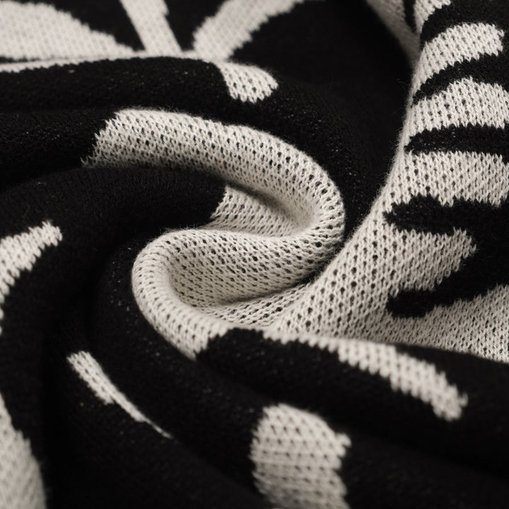 Herre sort dyre- og plante-jacquardstrik