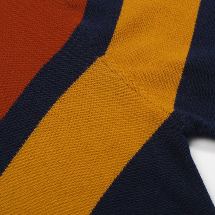 Terno feminino com saia de malha listrada azul escuro