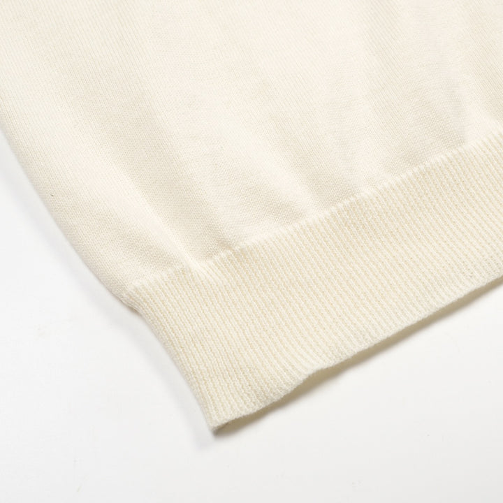 Herren apricot-weiße diamantförmige gestrickte V-Neck-Polo