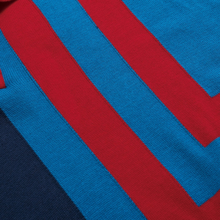 Donkerblauwe retro gebreide herenpolo met onregelmatige strepen