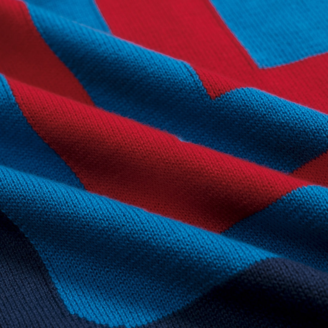 Donkerblauwe retro gebreide herenpolo met onregelmatige strepen