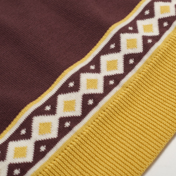 Bruine, retro grafische gebreide herenpolo met V-hals