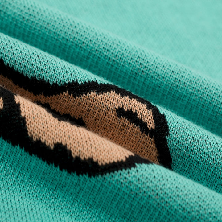 Groen gebreid T-shirt met V-hals en luipaardprint voor dames