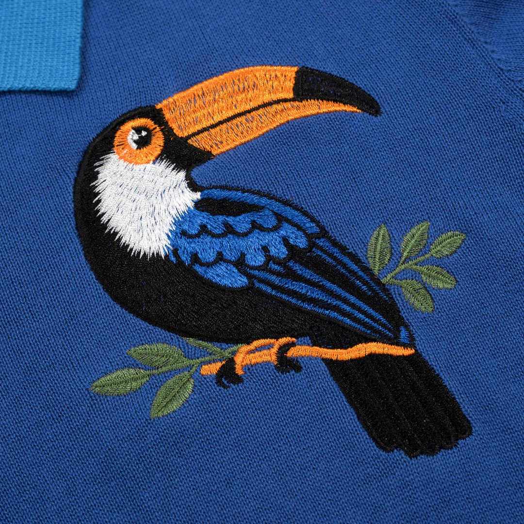 Heren blauwe vintage gebreide polo met dierenborduursel en V-hals