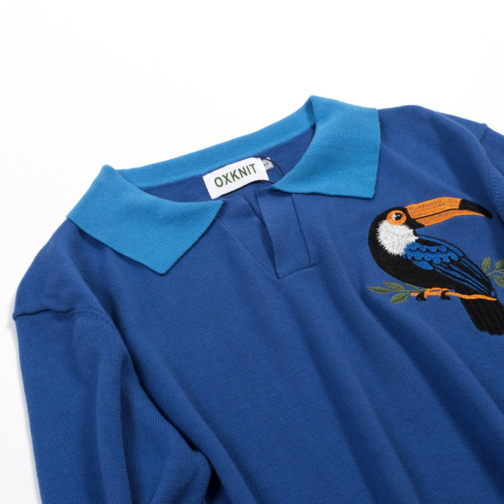 Heren blauwe vintage gebreide polo met dierenborduursel en V-hals