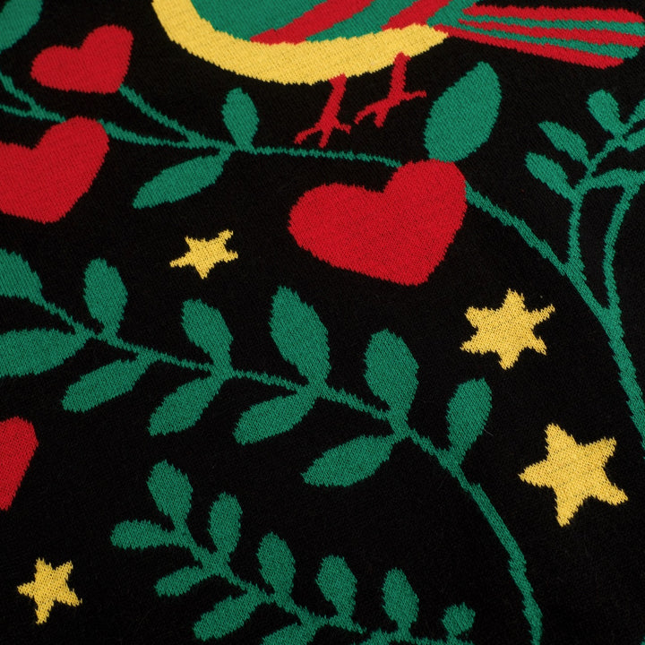 Camiseta de punto negra retro con estampado folk y cuello redondo para mujer