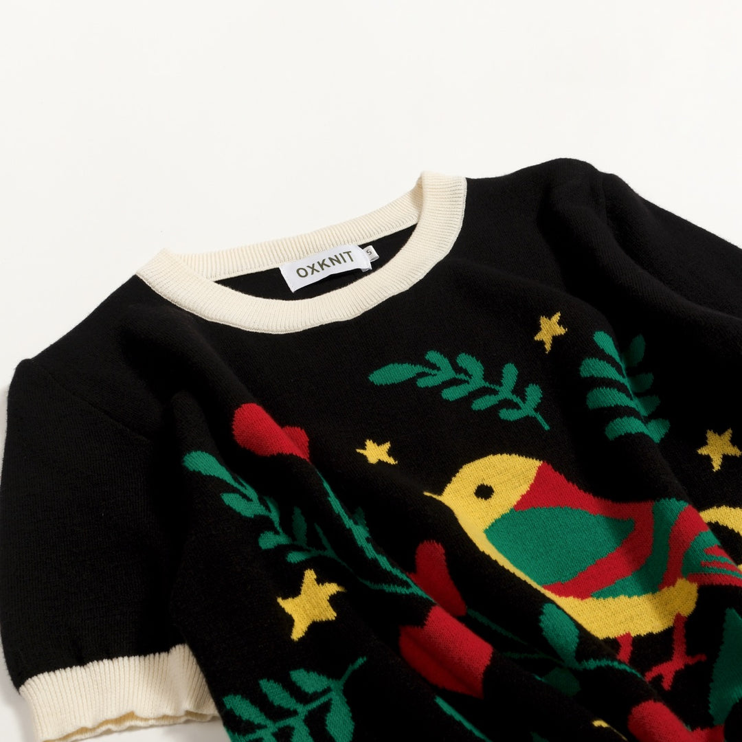 Camiseta de punto negra retro con estampado folk y cuello redondo para mujer