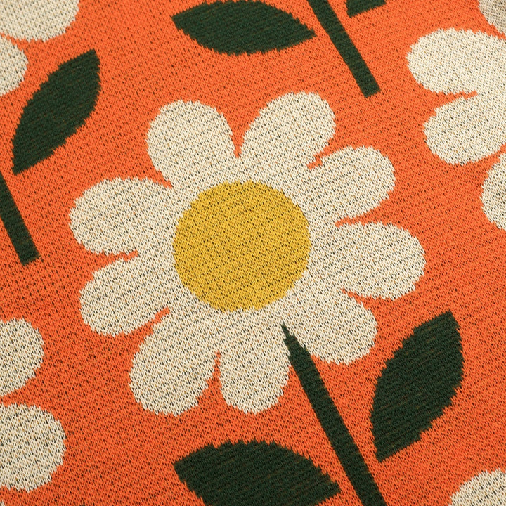 T-shirt en maille jacquard orange à motif floral marguerite années 70 pour femme